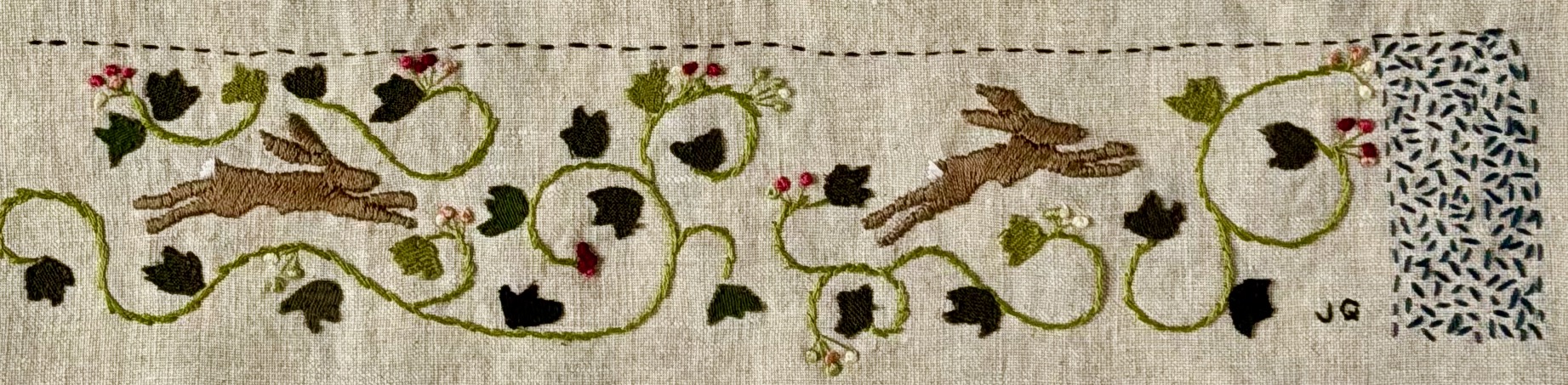 Hero — JQ's hand-stitched rabbits running through vines